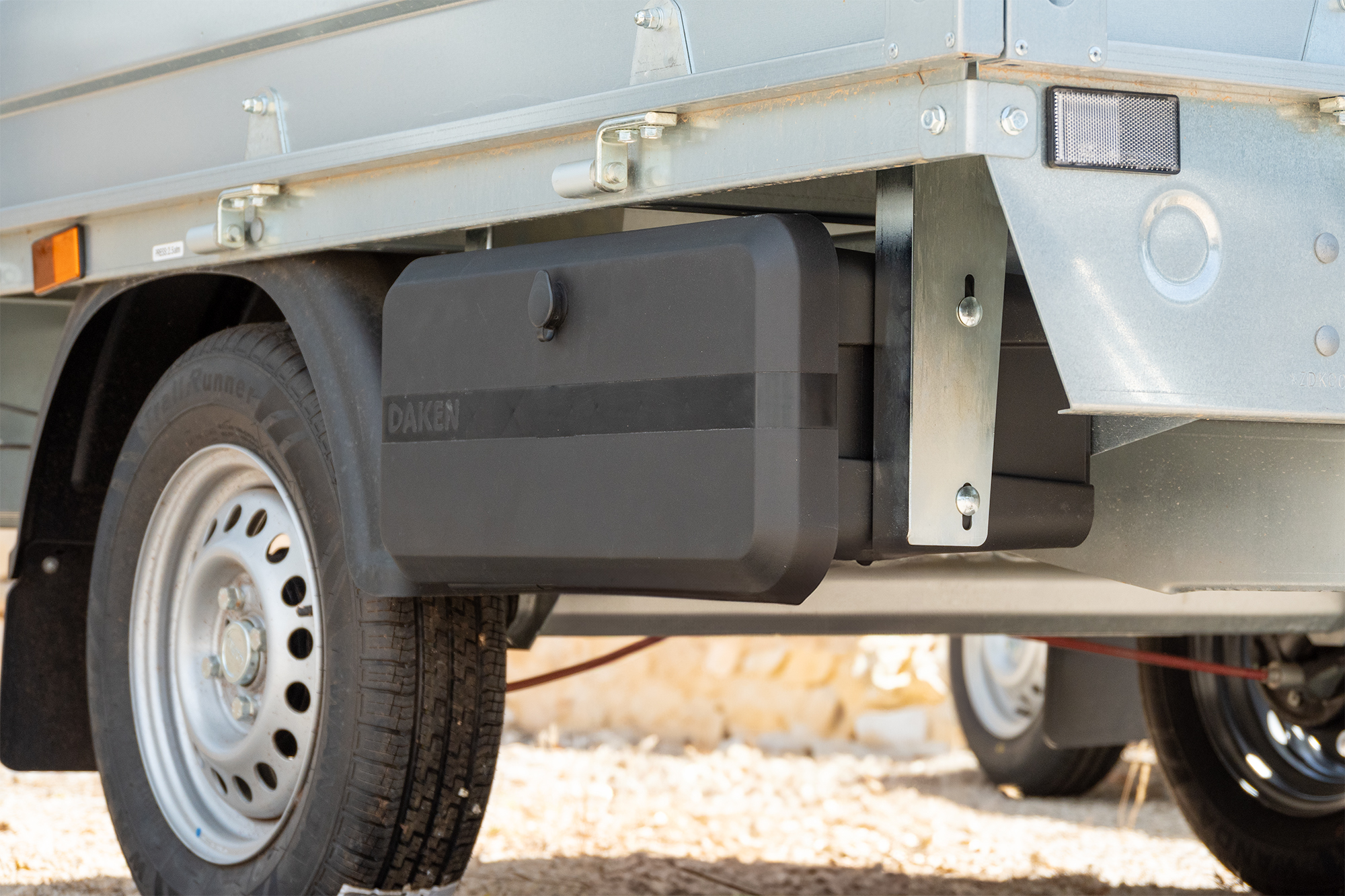 Blackit Lite - Closed toolbox installed on a small trailer, under-bed mounting
